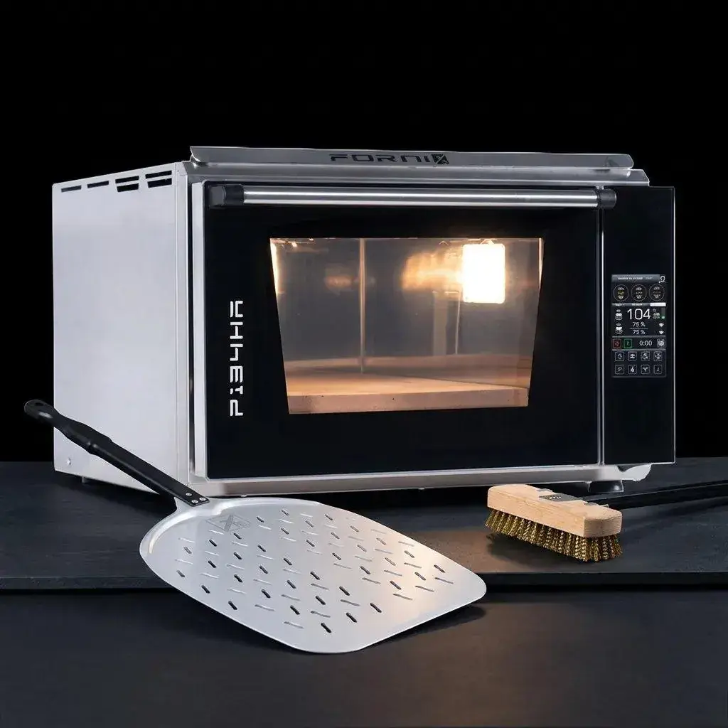 Four à pizza électrique portable Effeuno P134H avec sa pelle perforée et sa brosse en laiton